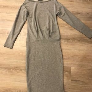 European shirt dress meant to gather at the waist.